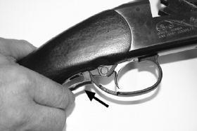 To break open the action, fully depress or squeeze the locking level toward the stock. (See Picture 11).