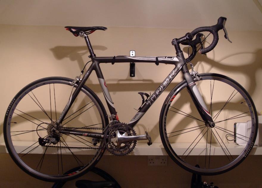 I did a couple of these on a Trek 1000 with Ironman aftermarket tri-bars. Not exactly the most aero set up, but then I didn t know much about aero at the time, just about enough to add the tri-bars.