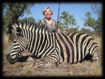 Sandy is an experienced huntress herself and also shot outstanding trophies with PH Charles.