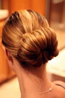 Use several bobby pins to pin in place (hidden under the hair). Repeat with the next four sections of hair.