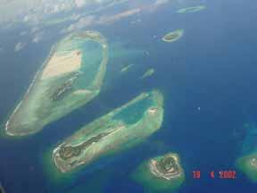 Plate 8. Land reclamation is almost an essential activity for economic well-being in the Maldives.
