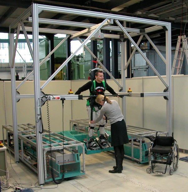 Another device, which employs force feedback in application of motion trajectories to the lower body, is the HapticWalker from the Fraunhofer Institute for Production Systems and Design Technology in