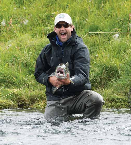 Chad Pike, owner of The Eleven Experience, celebrates landing a majestic salmon. My friend Chad Pike invited me to go fly fishing with him in Iceland. At first I wondered, why Iceland?