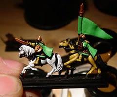 I chose a bright pastel green as the main colour for the cloaks, robes and banner. I used a 50/50 mix of Snot Green and Skull White.