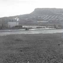 The erosion of ancient landslide rubble in West Dorset and East Devon supplied large quantities of gravel that was transported by the sea to Chesil Beach. This is known as longshore drift.