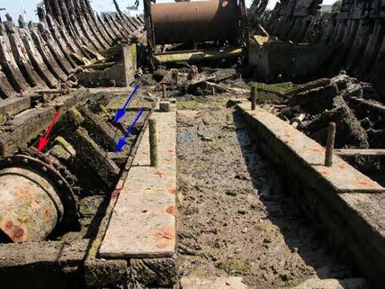 In the central section of the hull, beside what would have been the engine mounts there is evidence of further metal structures.