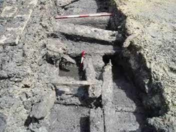 There are three sets of composite floor timbers running through trench FL5C.
