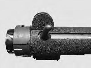 5. To remove the firing mechanism from the firearm, turn the firing mechanism lock (located on the right side of the grip) to the FREE position from the lock position.
