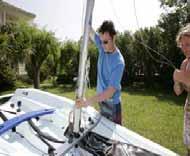 6. Raise the mast and position the mast heel on the mast step,