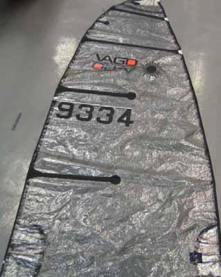 Sail number positioning It is advised to apply the sail numbers in a dry, clean and wind free environment. Standard sail 1. Lay the sail on a flat surface starboard side up. 2.