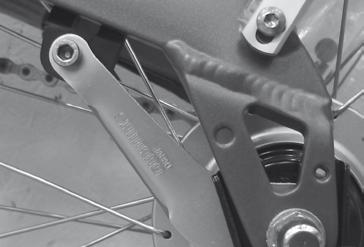 torque. Loosen the screw B. B A Loosen both axle nuts and remove the rear wheel.