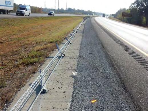 0 Brifen Description: A Toyota Camry contacted a cable barrier adjacent to its lane of travel after a minor contact with