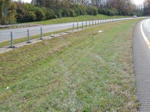 Appendix E Crash Site Inspections Description: A Toyota Camry rotated across the median impacted the