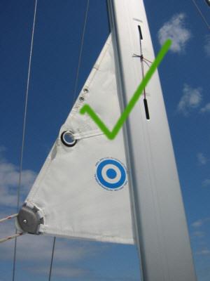 This is designed as a marker that will indicate when the mainsail is furled inside the mast enough so that the U.V. cover on both sides of the sail will protect the sail.