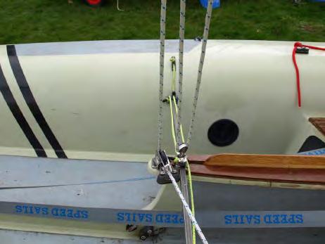 Photo 34, back up to the pulley on the boom Photo 35, the complete mainsheet Different traveller designs are used on