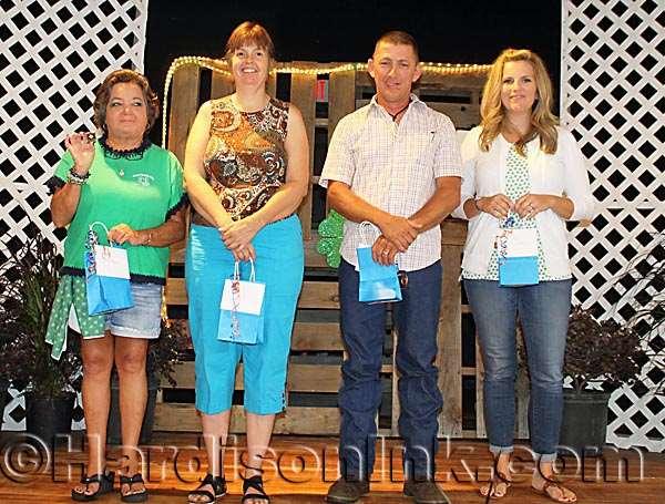 Levy County 4-H Leaders (from left) Mary Carr {proudly holding her pin with years of service}, Shawn