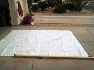 SAIL CUTTING and ASSEMBLY 10 x 12 White Tarp 10 x 12 White 6 oz Polytarp Trailing Edge Boom A Mast + 2 C 5 inches Mast Sail layout and measurement on driveway Boom + 2 B First