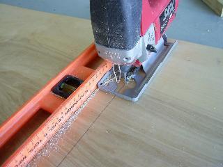 line. Photo 1 Photo 2 Note: Straightedge necessary for Jig Saw to cut in a straight line.