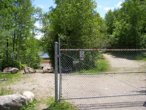 downstream of dam. Flat water above dam with light current. Access is gated to vehicles.