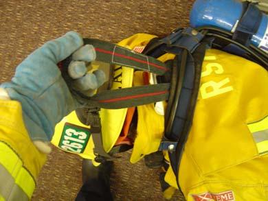 This technique of converting the SCBA into a harness, called harness conversion, will also prevent the SCBA from riding up or coming off of a downed firefighter who is being dragged.