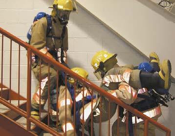 Engine Module Section 913.00 August 13, 2008 Page 10 of 12 Stair Raise Using the Handcuff Knot The handcuff knot can be utilized in moving a downed firefighter up stairs.