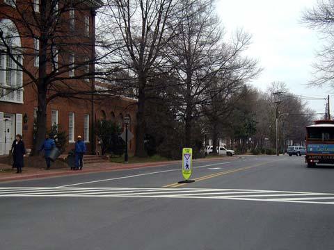 right-of-way to a pedestrian crossing the roadway within any marked crosswalk or within any unmarked crosswalk at an intersection.