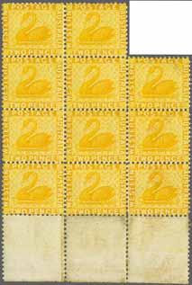 12, an irregular unused block of eleven, marginal from base of sheet, of vivid colour and somewhat dried large part or unmounted og.