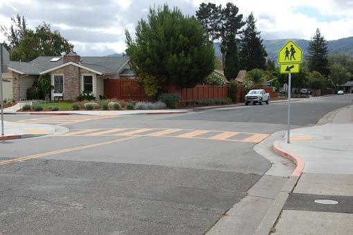 Curb Extensions (Bulb-Outs) Reference: Where to use: Improves safety by increasing visibility, reducing speed of turning vehicles, encouraging pedestrians to cross at designated locations, shortening
