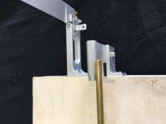 This will anneal the brass tubing, making it soft, and easy to bend. Anneal about 5 or 6 inches behind your mark. After it cools, carefully bend the tube at your mark.