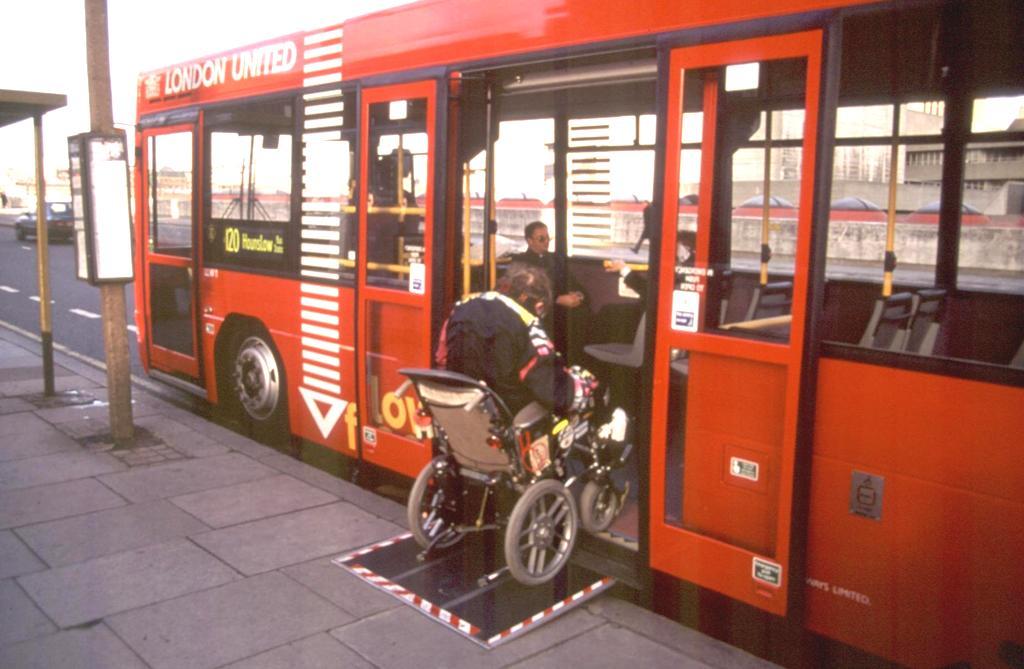 Passenger in a wheelchair boards using