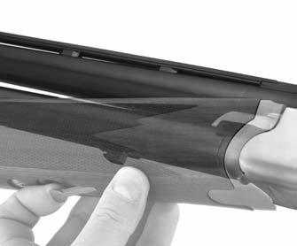 Swing the muzzle end of the barrels upward, pivoting the rear end of the monobloc downward to seat in the receiver as shown in Figure 17.