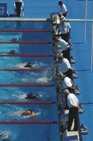 SW 2.6.2 in Action IT s must observe one full turn for each swimmer in each lane they are responsible for.