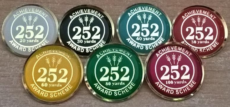 252 Awards Update You may remember that in the last Newsletter we had an article from Mark Gill about the 252 award, an opportunity to earn a series of badges at different distance by shooting rounds