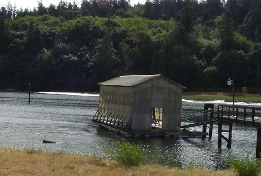 Figure 12-2: A boat house on Whidbey Island shelters the boat from the weather. (Photo by Betty Renkor.