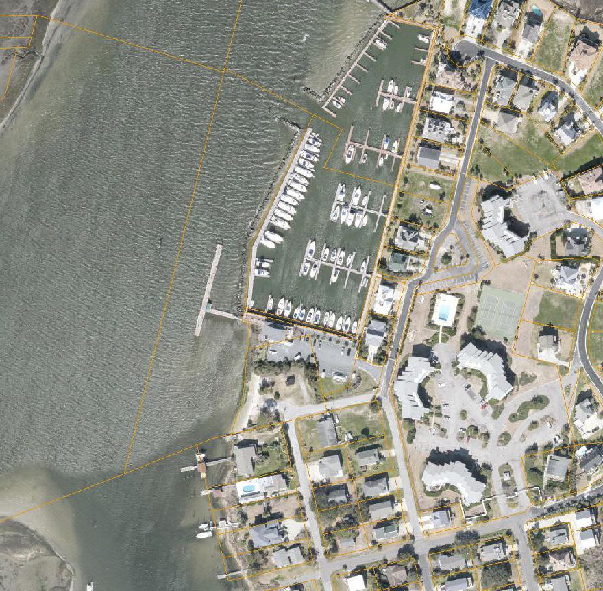 Property Summary > Address: 401 Marina St. Carolina Beach, NC 28428 > Acreage: ± 5.58 acres ± 1.5 Acres of uplands; ± 4.