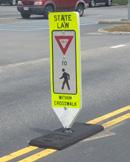 for a pedestrian in a crosswalk. Additionally, while 10-15 can be used at signalized intersections, 10-23 shall only be used with pedestrian hybrid beacons.