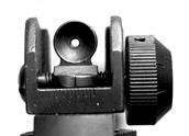 The rear sight is adjustable for elevation by raising the aperture up to raise the shot s point of impact and down to lower the shot s point of