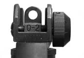 To adjust windage it is necessary to move the rear sight aperture left or right by using the knob on the right side of the rear sight (as viewed