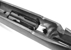 INTENDED MERELY TO HOLD THE TRIGGER GUARD IN PLACE, OVER TIGHTENING THIS SCREW WILL CAUSE DAMAGE TO THE STOCK. 5. Remove the stock.