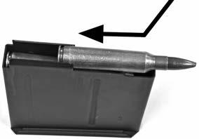 As shown in FIGURE 23 or FIGURE 24 ( BA ), load the correct caliber cartridges into the detachable box magazine by pressing downward, filling the magazine to capacity (see SECTION 9 AMMUNITION BULLET
