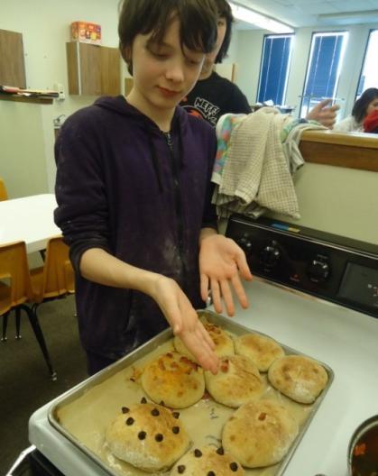 the students bake nutritious bread, stir fry and spring rolls.
