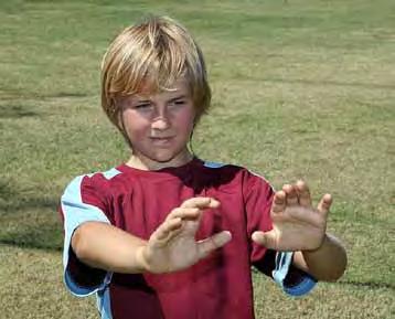 4 Present Target to passer - hands with fingers facing up and thumbs and first fingers making a (W) with space