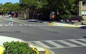 Raised crosswalks can also be used to extend the level of the sidewalk across the road and act as a traffic calming measure.