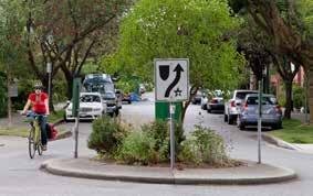 involve extending the curb on one or both sides of the roadway, narrowing the roadway width.