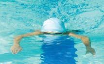 breaststroke kick by bending knees and pulling feet towards bu ocks (under the water).
