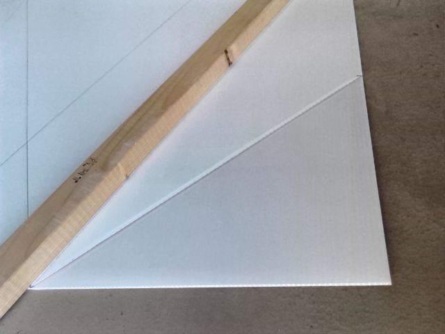 FOLDED Bow Area Using a strong straightedge, like a 2x3 as shown, press firmly down on the bend line, and pull the Coropalst up slowly toward the