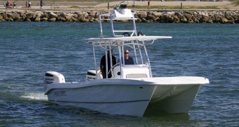The OceanCat 310 SE s solid, handlaminated multi-hull slices through heavy chop and large wakes like