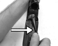2. Make sure the trigger block safety is engaged in the on or safe position. (See Picture 33).