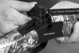 You should hear an audible click and feel the detent ball lock into place. The Torch Cam breech block must be locked into place to fire the firearm.