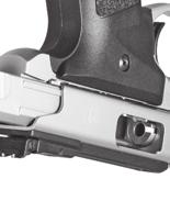 With the muzzle still pointing in a safe direction, and with your finger off the trigger and outside the trigger guard, grasp the sides of the bolt from the rear with your